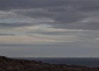 Sunlit icebergs on the horizon. : Horseshoe Island
